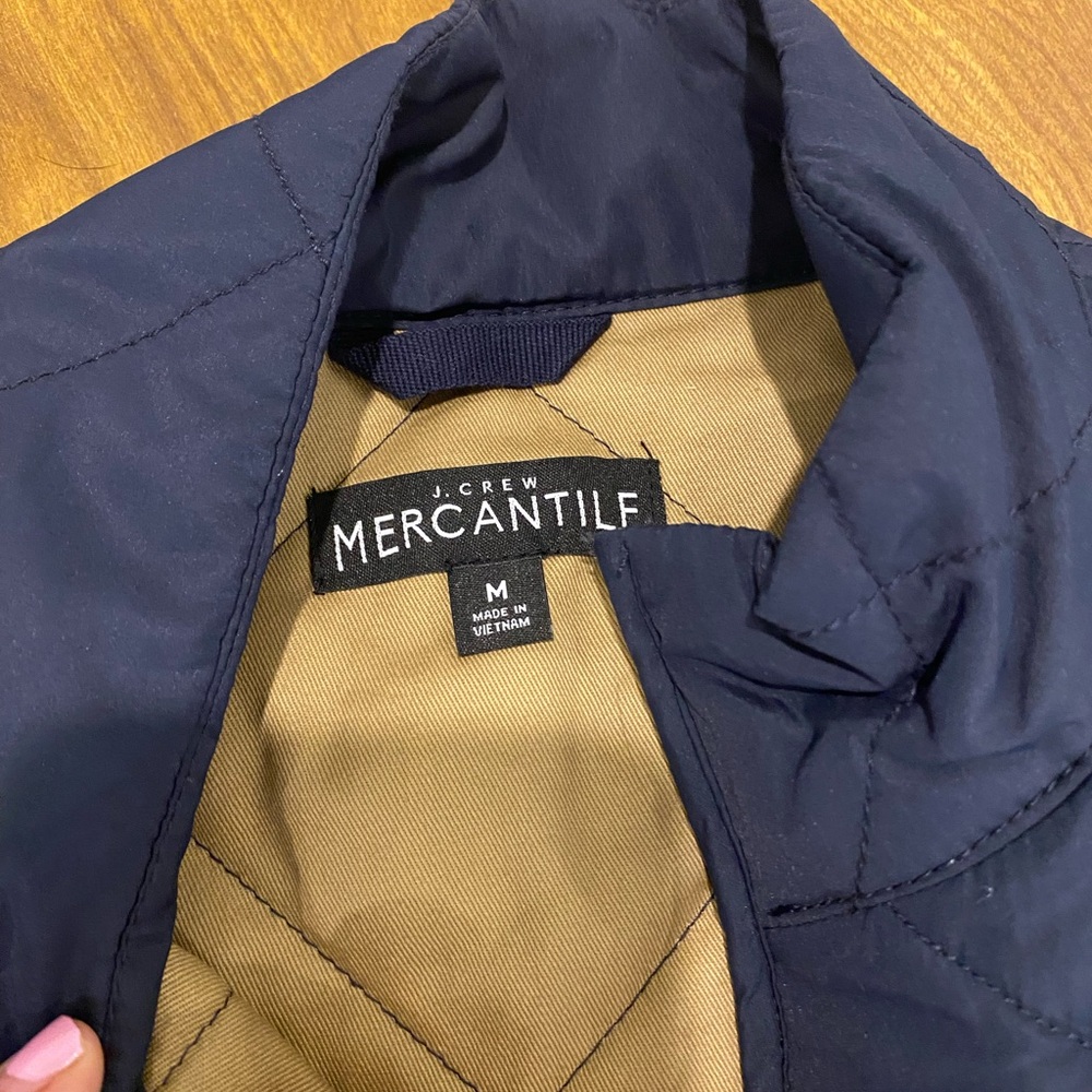 Two Men’s J.Crew Mercantile vests. Size Medium. One black and one navy blue.
